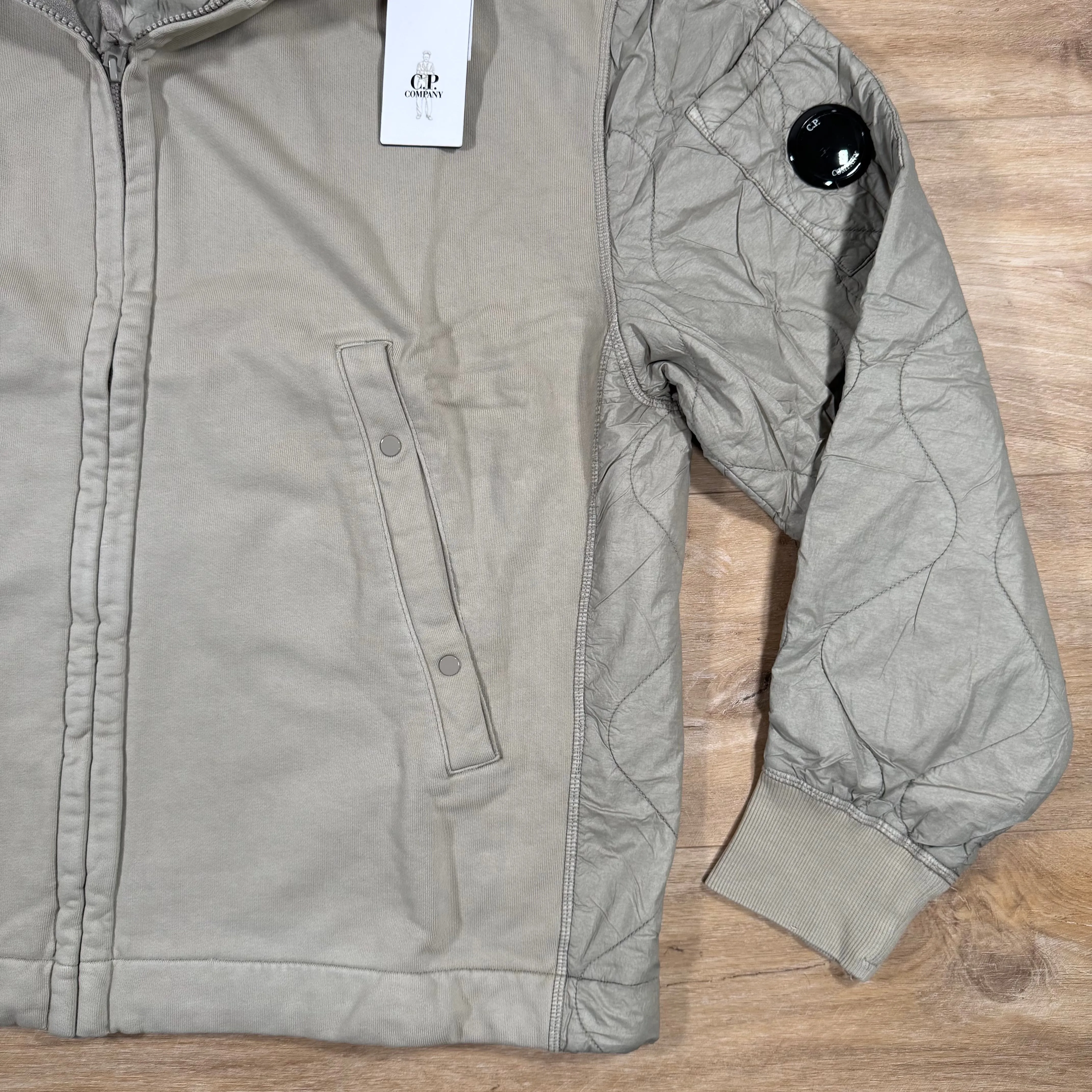 C.P. Company Diagonal Raised Mixed Quilted Lens Hoodie in Vintage Beige