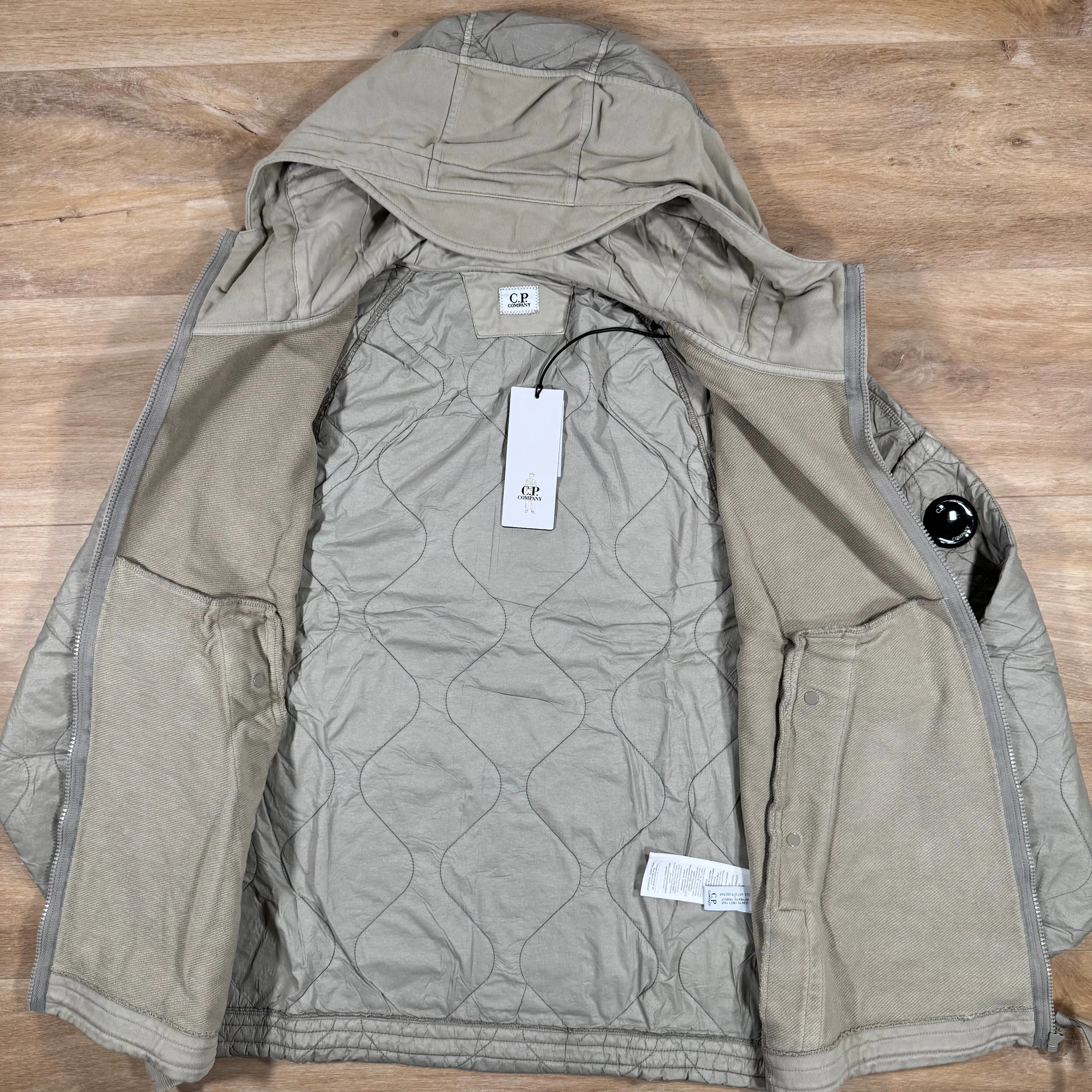C.P. Company Diagonal Raised Mixed Quilted Lens Hoodie in Vintage Beige